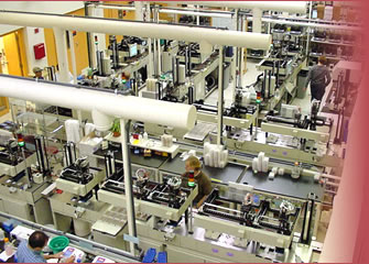 Researchers working at an NHGRI-supported large-scale sequencing center. Courtesy: The Broad Institute of MIT and Harvard
