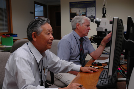 Drs. Akio Awa (foreground) and Gordon Livingston