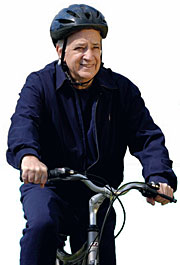 a senior citizen riding bicycle