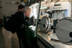 Argonne scientists Ira Bloom (front) and Javier Bareño prepare a sample of battery materials for Raman spectroscopy, which is used to gather information regarding the nature of the materials present in the sample. | Photo courtesy of Argonne National Laboratory.