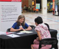 2010 Road Show - A woman consults with a doctor about heart health at The Heart Truth Road Show in Albuquerque, NM.