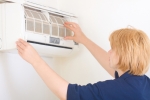 Replacing or cleaning air conditioner filters is a critical maintenance task. | Photo courtesy of ©iStockphoto/firemanYU.
