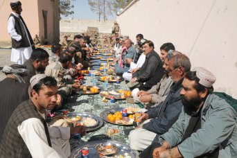 District leaders of Spin Boldak, Afghanistan, meet at the district center to discuss the future of the district, Feb. 11, 2013. The meeting was the first time that government, military and civilian leaders have ever come together to solve problems in the district.