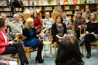 Dr. Jill Biden, wife of U.S. Vice President Joe Biden, talks with teachers at the Grafenwoehr (Germany) Elementary School during a visit to the training center Feb. 2, joined by U.S. Army Europe deputy commander Maj. Gen. James C. Boozer (left) and Command Sgt. Maj. David Davenport Sr. (center). During her visit Biden also met with Soldiers and military families and watched training conducted by USAREUR's Joint Multinational Training Command.