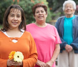 3 women and a flower