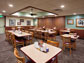 Image of a dining room of a Denny's restaurant illuminated with Cree LR6 LED downlights.
