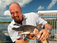 Photo of Shark Defense researcher Patrick Rice with a bonnethead shark.