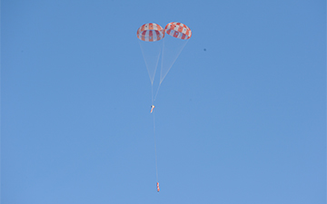 Two of Orion’s three main parachutes fully inflate during the latest parachute test at the U.S. Army’s Yuma Proving Ground on Tuesday, Feb. 12, 2013. Photo Credit: NASA