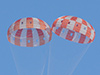 Two of Orion’s three main parachutes fully inflate during the latest parachute test at the U.S. Army’s Yuma Proving Ground on Tuesday, Feb. 12, 2013. Photo Credit: NASA