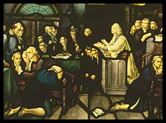 Stained glass window of men inside a church praying, many with white old-fashioned wigs
