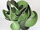 Photo of curve-crease sculpture called Green Balance, created by Erik and Martin Demaine.