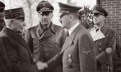 Marshal Pétain, left, greets Adolf Hitler in Montoire, France, 1940