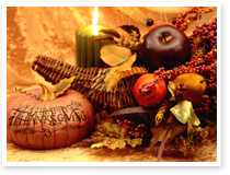 This is an image of a Thanksgiving still life with candle.