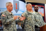 Brig. Gen. Donald M. MacWillie, Fort Riley senior commander, speaks to the media...