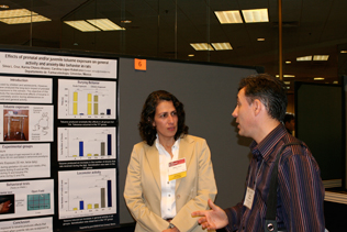 Silvia Cruz (1996-97 INVEST Fellow - Mexico) speaking with Carlos Zubaran (2009 DISCA)