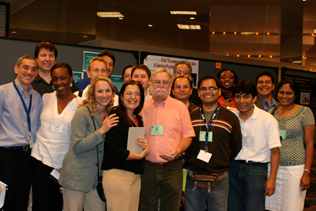 Jim Anthony, recipient of the Award of Excellence, and his former trainees