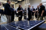 Energy Secretary Steven Chu meets with students from Front Range Community College at the <a href="http://www.sitnusa.org/">Solar Instructor Training Network</a> exhibit at the SunShot Grand Challenge Summit and Technology Forum in Colorado. | Photo by Dennis Schroeder, NREL. 