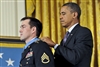 President Obama awards the Medal of Honor to former Army Staff Sgt. Clinton L. Romesha at the White House 