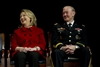 Former Secretary Clinton and Gen. Dempsey laugh at the remarks of Secretary Panetta 