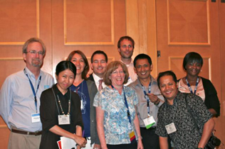 Left to right: Rear, Steve Gust, A. Ender Altintoprak, Brent Manch, Roman Gabrhelik, Hla Aung, Abimbola Onigbanjo Williams, Front, Bangone Santavasy, Dale Weiss, Ashish Sinha