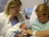 Medical student, new mother and baby