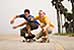 Welcome: Portraits of America, two young men skateboarding