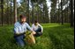 Photo of researchers and Loblolly Pine trees.