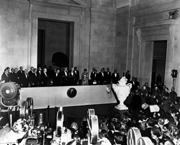 Image: President Franklin D. Roosevelt speaks at the dedication of the new National Gallery of Art. Paul Mellon, son of Gallery founder Andrew Mellon, stands fourth from the left in the front row