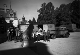 Image: Moving vans carrying works of art from the National Gallery's collection wait outside Biltmore House