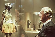 Image: National Gallery benefactor Paul Mellon contemplates Edgar Degas' Petite Danseuse de Quatorze Ans, installed in the West Building's ground floor sculpture galleries