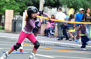 Girl roller skating, Wellness Week 2012, Peru.