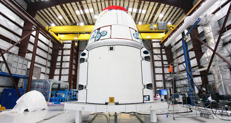 SpaceX Dragon inside processing hangar