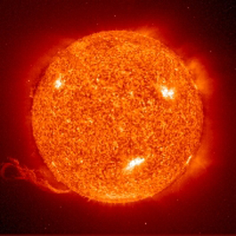 The sun is basically a giant ball of hydrogen gas undergoing fusion into helium gas and giving off vast amounts of energy in the process.