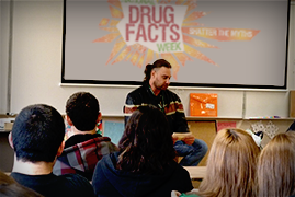 Man speaking at a Nationsl Drug Facts Week event