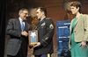 Secretary Panetta presents former Army Staff Sgt. Clinton L. Romesha with a Medal of Honor Flag 
