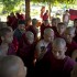 Buddhist monks, some of who escape from the security forces crack down, listen to radio news cast from a monastery in Monywa, northwestern Myanmar, Thursday, Nov. 29, 2012 (AP)