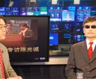 Chinese dissident Chen Guangcheng (right) is interviewed by VOA's Huchen Zhang