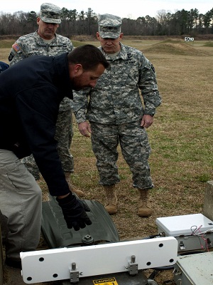 Brig. Gen. Lundy is shown the LOMAH system at Fort Eustis.
