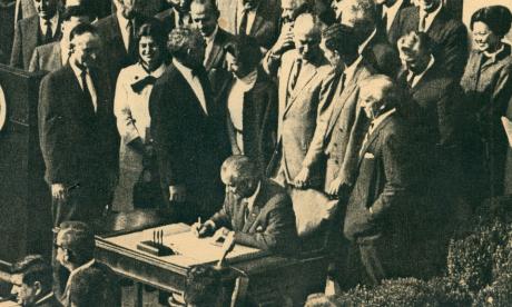 President Lyndon Johnson signs the legislation creating NEH and NEA, 1965