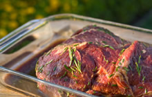 Meat marinating in an ovenproof dish