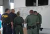 CBP officers and Border Patrol agents receive direction on Ike recovery missions.