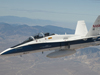 NASA's F/A-18B mission support aircraft 852 is pictured flying over the high desert near the Tehachapi Mountains northwest of Mojave, Calif. The aircraft is flying a series of low-supersonic flight profiles during the Farfield Investigation of No Boom Threshold, or FaINT, flight research project at