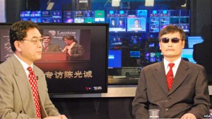 Chinese dissident Chen Guangcheng (right) is interviewed by VOA's Huchen Zhang 