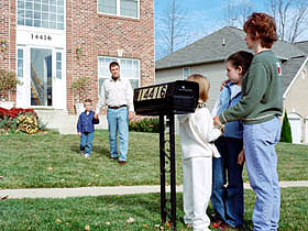 Photo of family practicing their evacuation plan