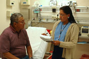 IHS Physician Assistant talks with a patient