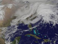 A massive winter storm is coming together as two low pressure systems are merging over the U.S. East Coast.