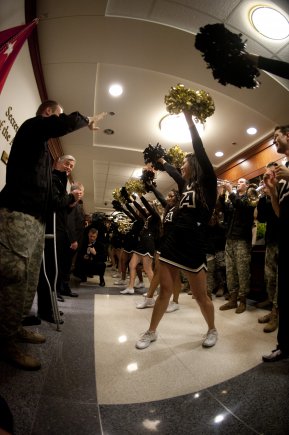 Secretary of the Army John McHugh gets a dose of Army Spirit outside his
Pentagon office on the eve of the 113th Army-Navy game.  (US Army Photo by. Spc. John G. Martinez)