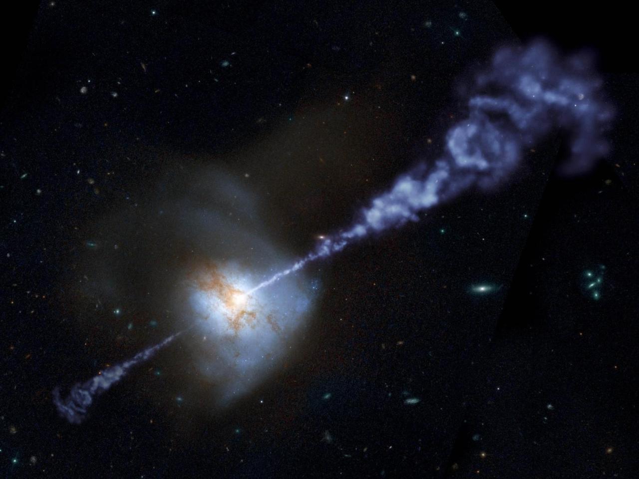Image description: This artist concept of the local galaxy Arp 220, captured by the Hubble Space Telescope, shows that galaxies with the most powerful, active, supermassive black holes at their cores produce fewer stars than galaxies with less ones. Learn more about how active black holes squash star formation.
Image courtesy of NASA/JPL-Caltech