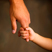 Child Holding Father's Hand