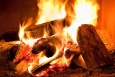 A warm fireplace can save you energy and money with proper maintenance. | Photo courtesy of ©iStockphoto.com/Pgiam.
